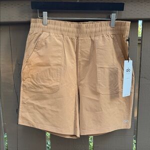 NEW, Never Worn, ALO Yoga Men's Athletic Shorts, Mustard color, size Men’s M